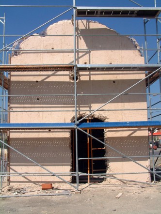 Estado de uno de los paramentos del exterior antes de la restauración.